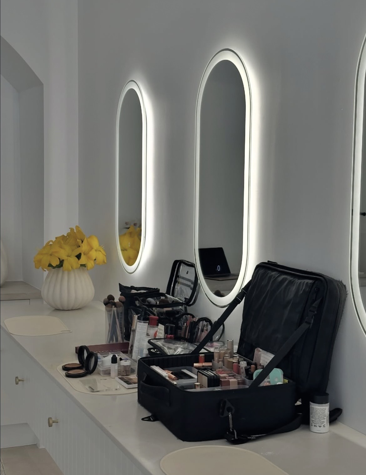 Backlit oval makeup mirrors